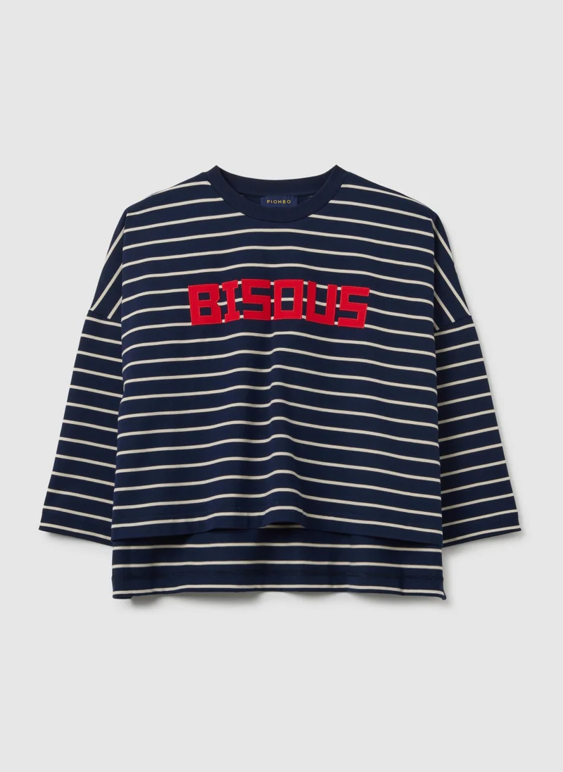 او في اس تيشيرت قطن واسع متعدد الألوان من أو في إس