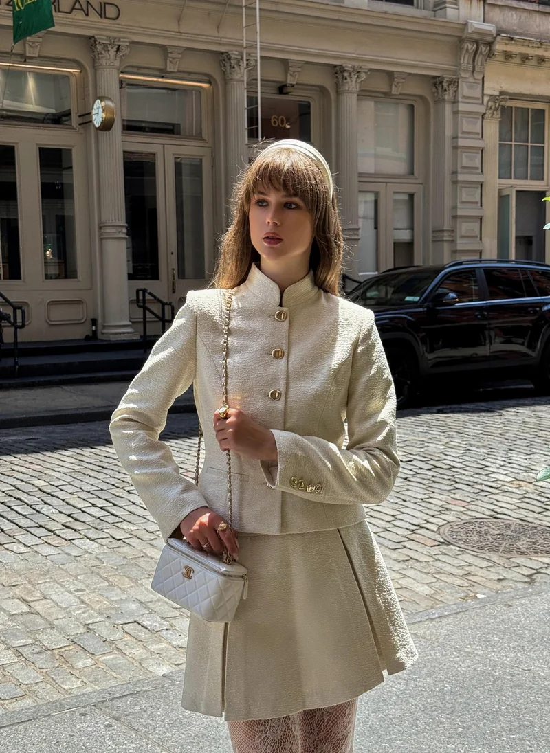 Lichi Flared mini skirt with pleats on the sides