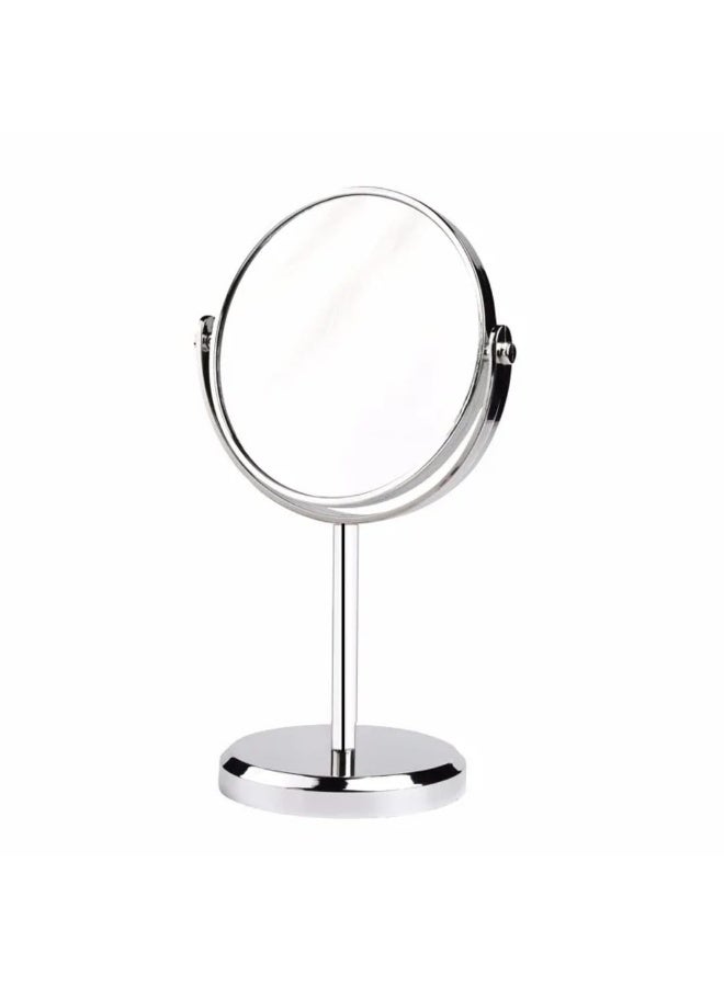 A round mirror with a double-sided rotating head and a regular speaker (silver color) designed for desktop makeup application. - Image 1