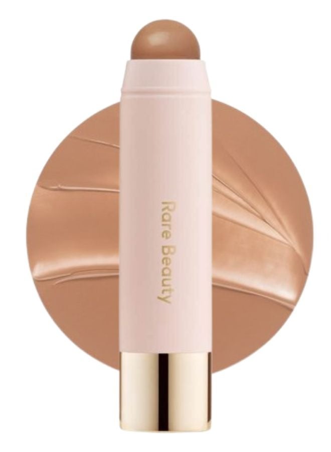 Rare Beauty Rare Beauty by Selena Gomez Warm Wishes Effortless Bronzer Stick – Happy Sol - Light Brown With Cool Undertones, 7g) | Weightless, Blendable Cream Bronzer for a Sun-Kissed, Natural-Looking Warmth  - Image 1