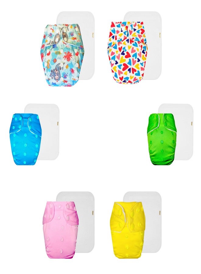 حفاضات دمبلدو القماشية الممتازة مع حشوة قطنية (عبوة من 6 قطع) | شعور بالجفاف والراحة | مانعة للتسرب | أزرار كبس قابلة للتعديل | موثوق بها من قبل الأمهات | من 3 أشهر إلى 3 سنوات | للجنسين - Image 1