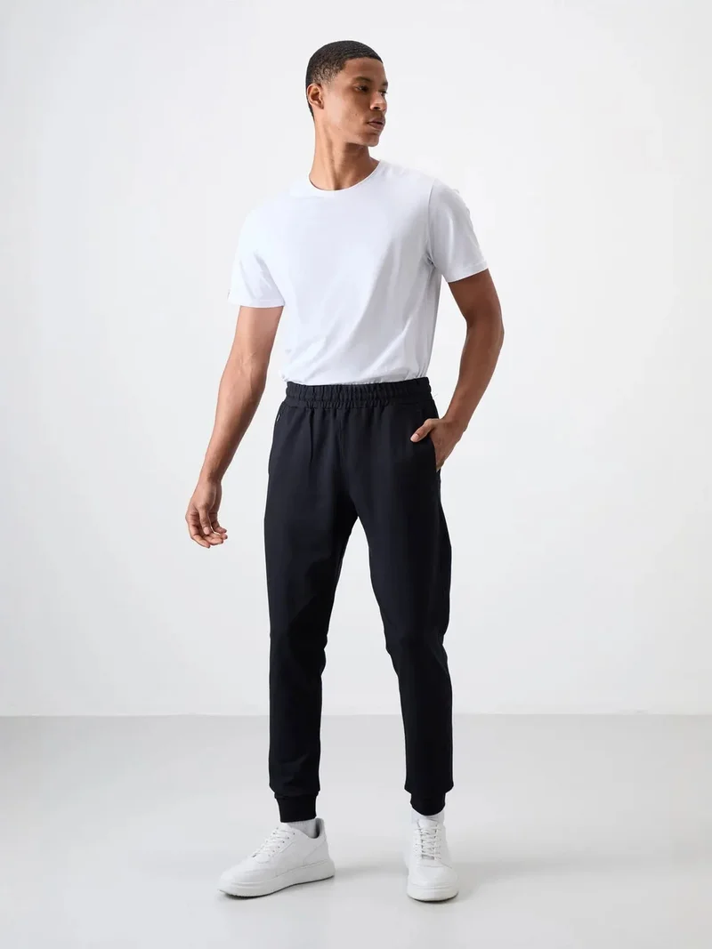 تومي لايف TOMMY Men's Regular Fit Cotton Blend Sweatpants