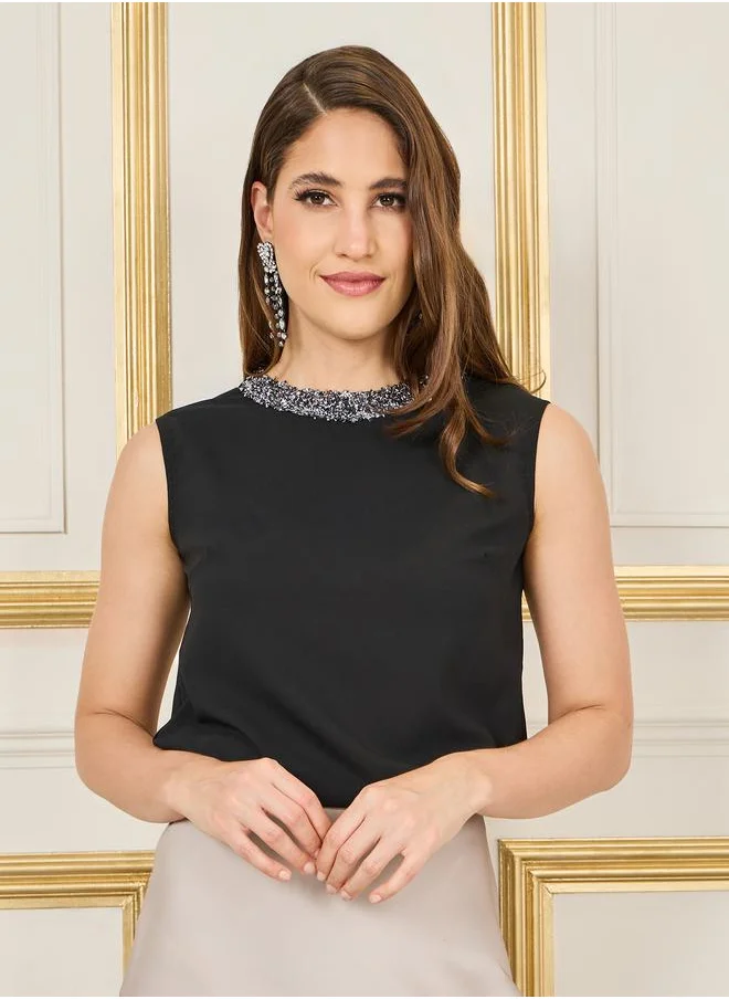 Styli Embellished Neck High Low Hem Blouse