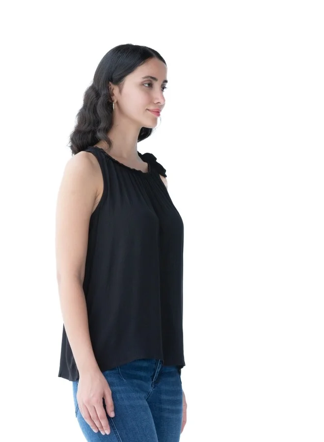 ZABAIONE Versatile black sleeveless top with a gathered neckline, perfect for layering or standalone use.