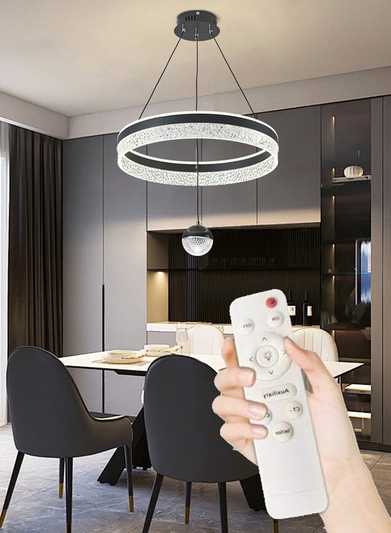 A fashionable LED pendant light with a circular light ring, adjustable in height, available in three colors of light, suitable for use as a pendant light in bedrooms, living rooms, dining rooms and family rooms. - Image 1