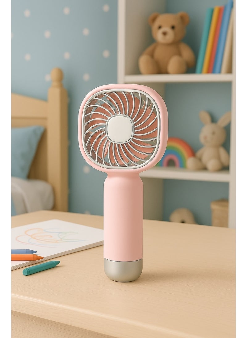 مروحة يد صغيرة YM88206 - قابلة للشحن بقوة تبريد عالية -  تصميم صغير وخفيف مناسب للحمل في أي مكان – بطارية قابلة لاعادة الشحن – بمنفذ شحن USB  - مناسبة للاطفال من 6 سنوات لاكثر -  لون وردي - Image 3