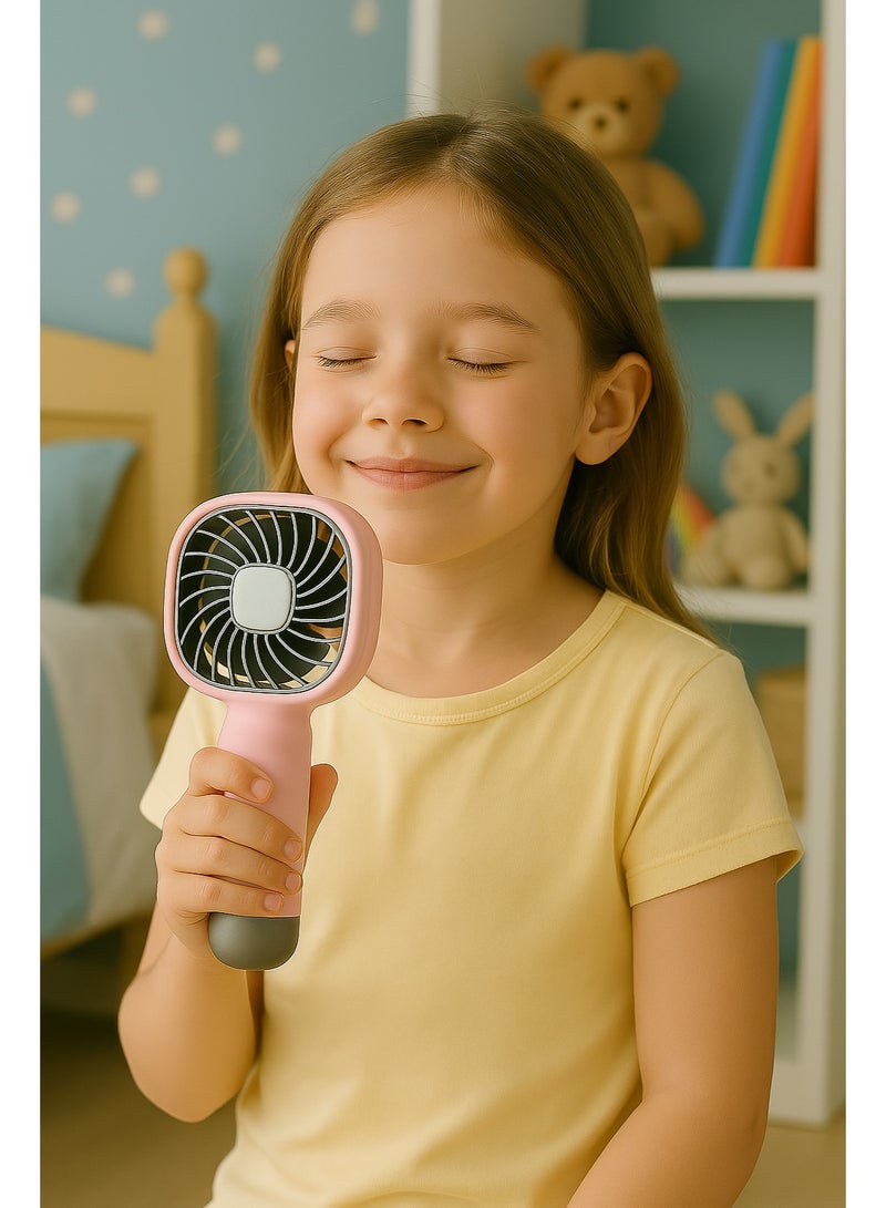 مروحة يد صغيرة YM88206 - قابلة للشحن بقوة تبريد عالية -  تصميم صغير وخفيف مناسب للحمل في أي مكان – بطارية قابلة لاعادة الشحن – بمنفذ شحن USB  - مناسبة للاطفال من 6 سنوات لاكثر -  لون وردي - Image 4