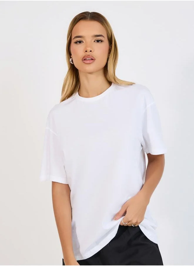 Styli Oversized Butterfly Graphic T-Shirt with Pocket Detail