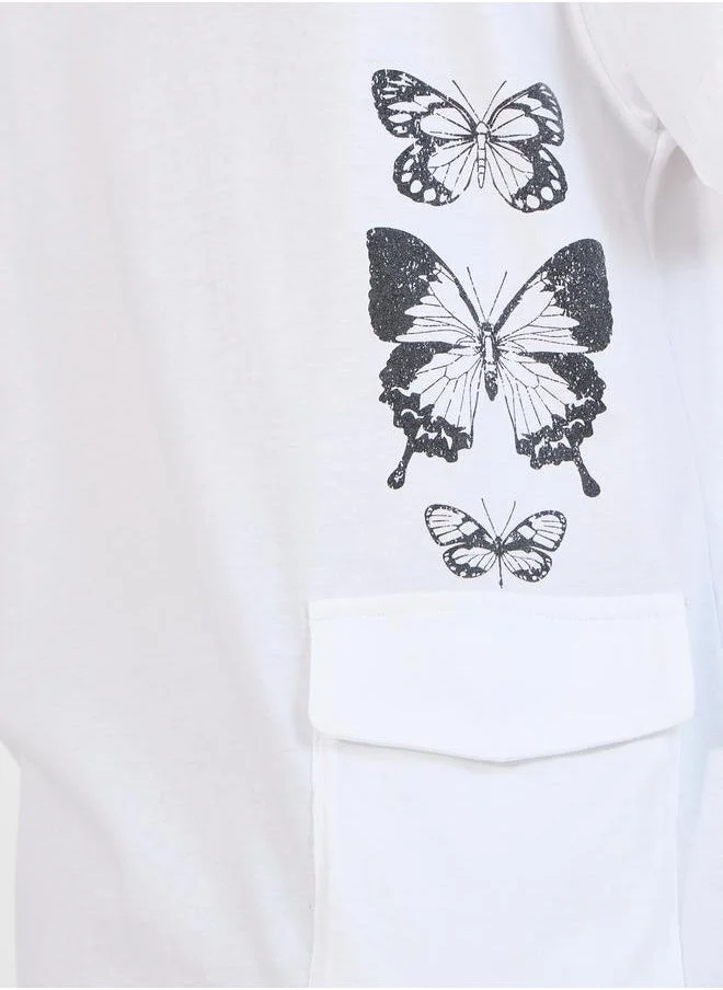 Styli Oversized Butterfly Graphic T-Shirt with Pocket Detail
