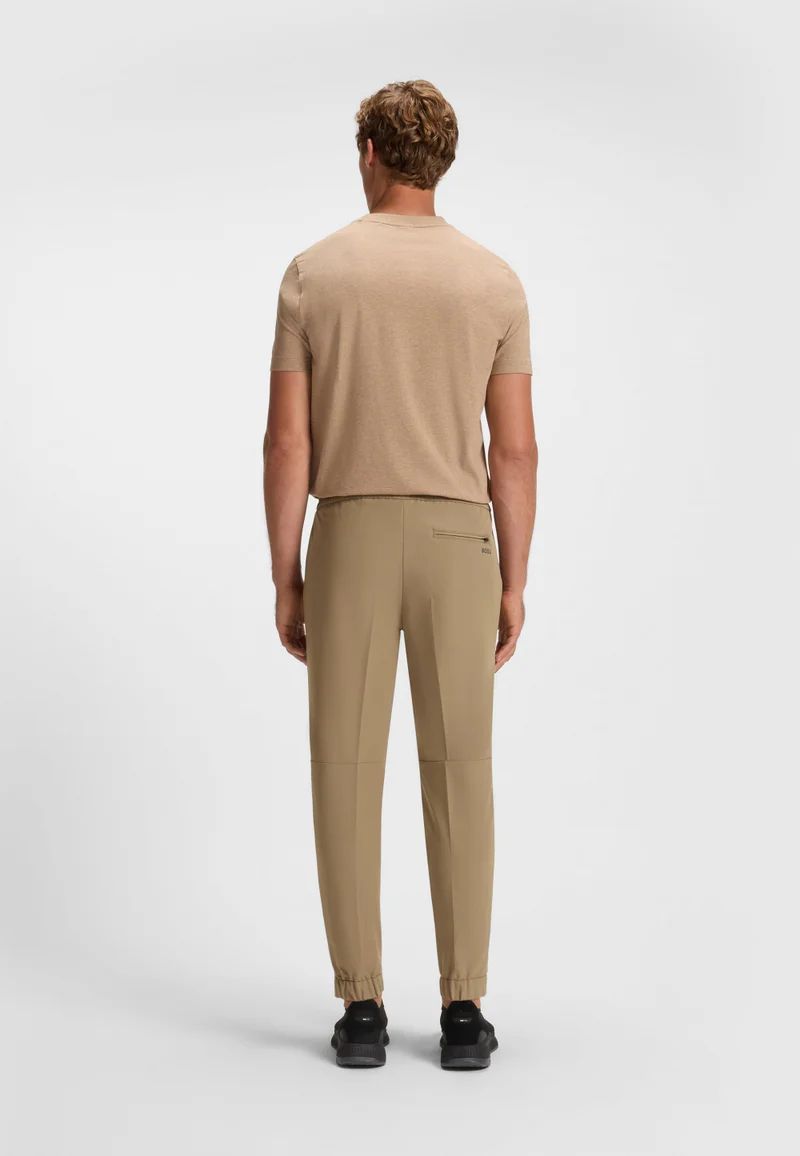 بوس Tapered-fit trousers in water-repellent stretch fabric