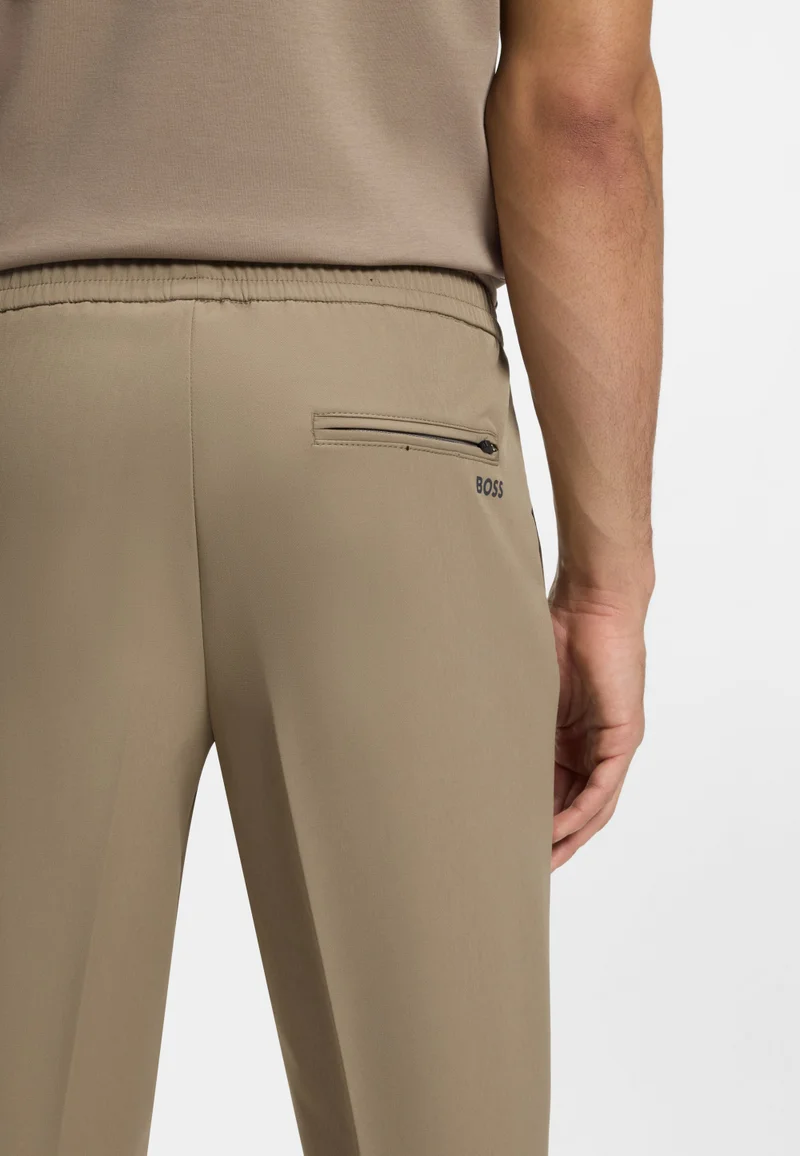 BOSS Light Green Tapered-fit trousers in water-repellent stretch fabric for Men | Best Price UAE
