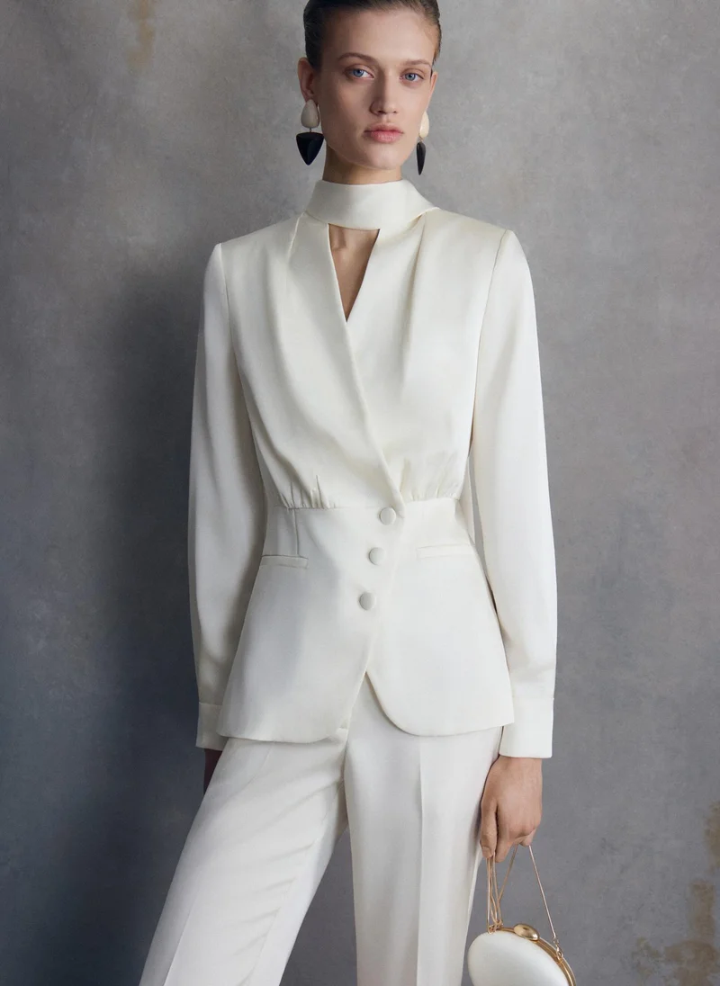 Satin blouse with a peplum and decorative scarf