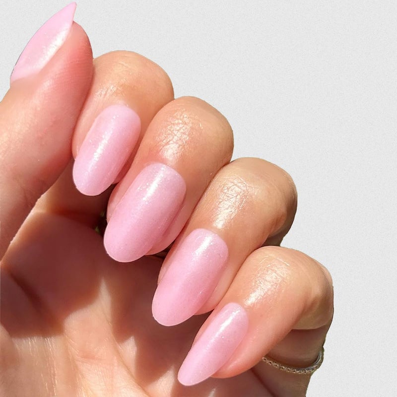 Olive & June Instant Mani Press-On Nails (Glue) | 42 Fake Nails, 21 Sizes | Non-Toxic, Long-Lasting Recycled Materials Realistic Look | Spring Flowers & Patterns | Medium, Oval | Iridescent Pink - Image 1