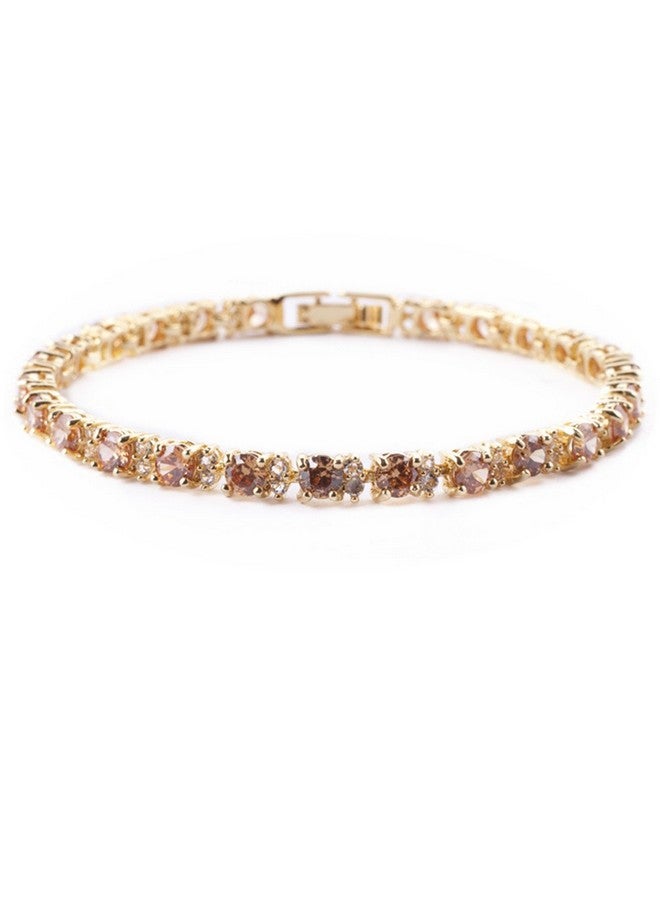RIZILIA Eternity Tennis Bracelet & Round Cut Champagne Color Cubic Zirconia In Yellow Gold Plated 7" - Image 1