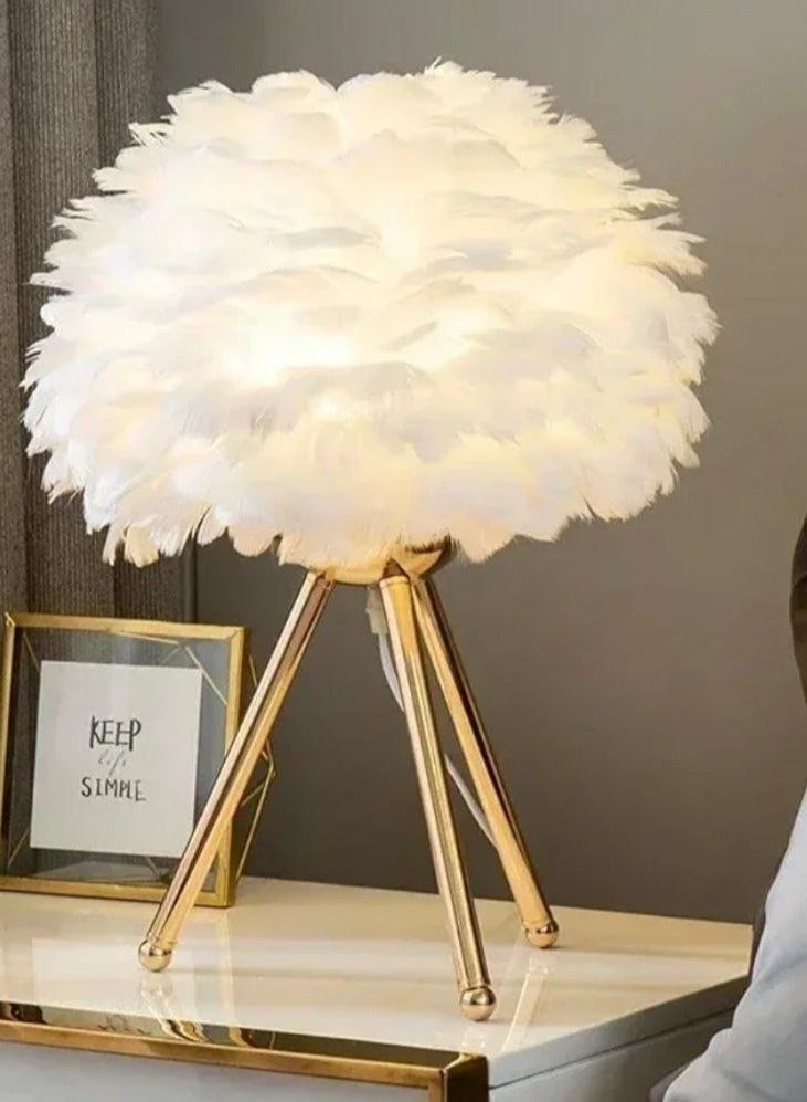Three-legged feather lamp