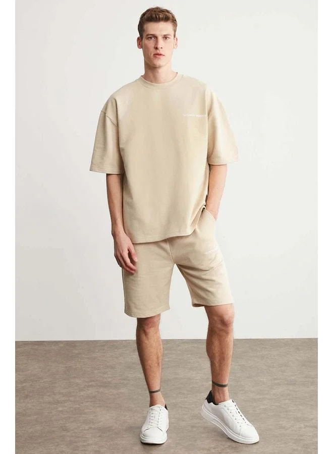 Grimelange Colombía Men's 2-Piece Comfort Fit Relaxed Cut Embroidered Letter Beige Tracksuit, No Drawstring.