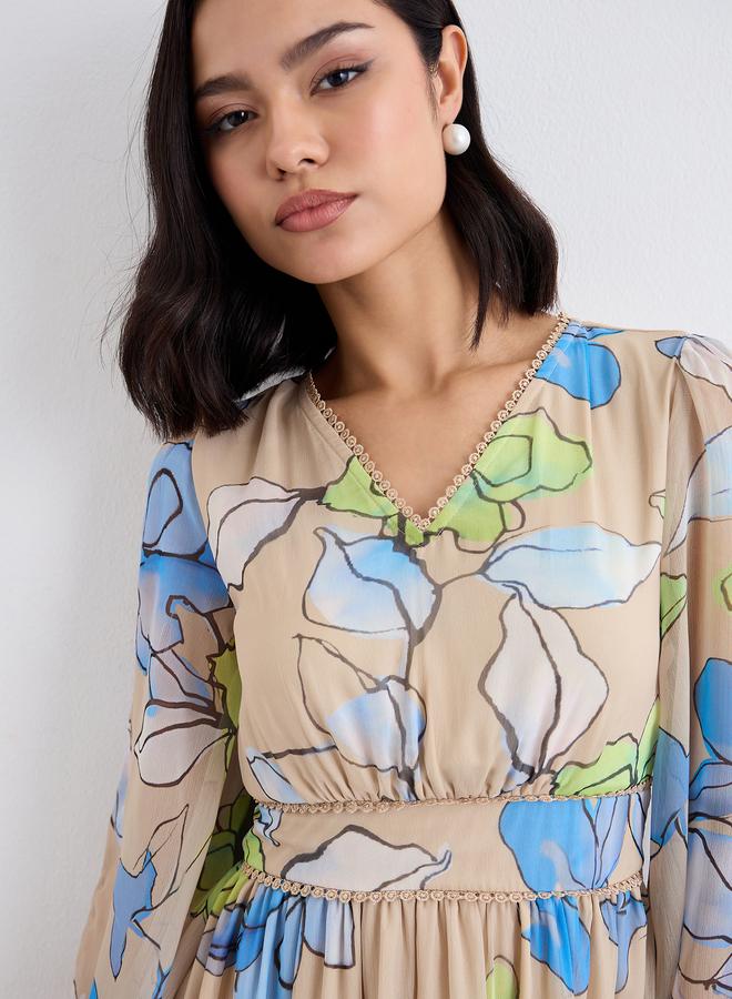 ستايلي فستان ماكسي مطبوع بالزهور بأكمام منفوشة - Image 3