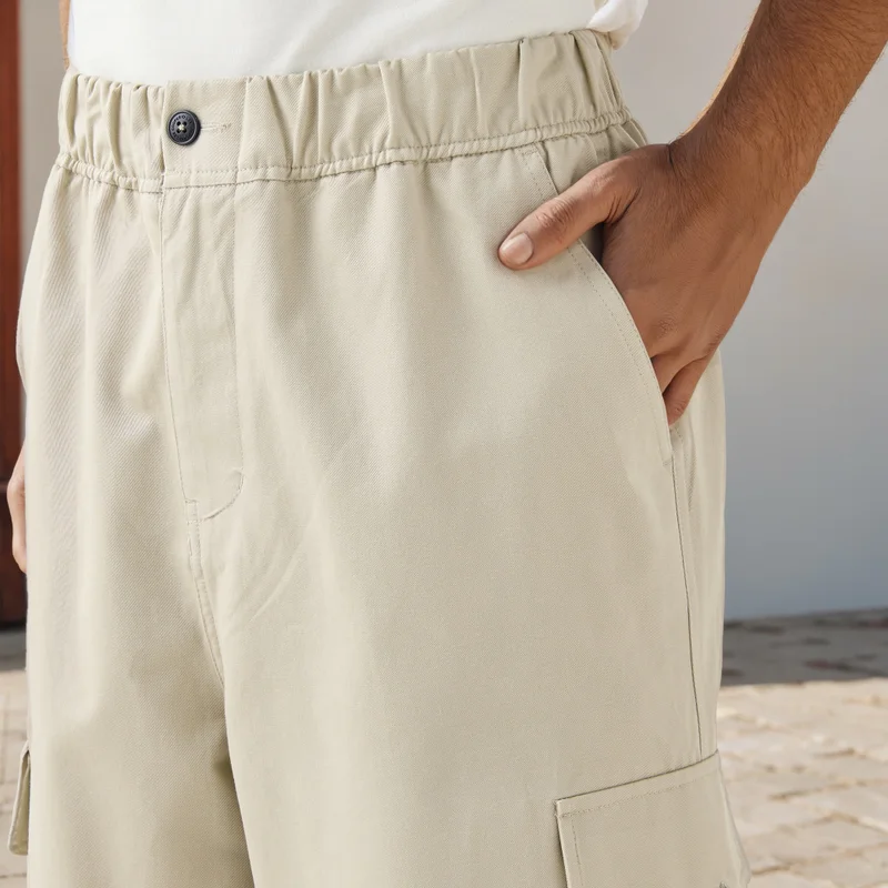 Lee Cooper  Lee Cooper Parachute Fit Pants with Button Closure and Pockets for Men | Best Price UAE