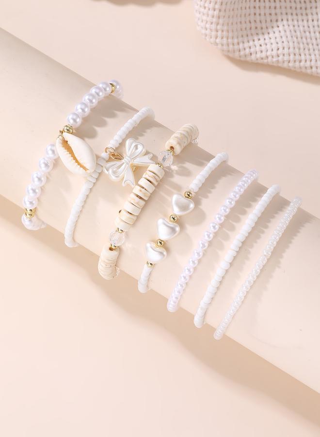 Take Two Pack of 7 - Girls White Pearl and Seashell Beaded Bracelets - Image 1