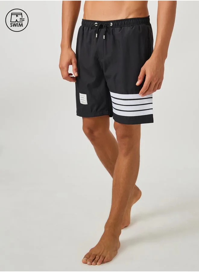 ستايلي Styli Striped Regular Fit Swim Shorts with Badge Detail