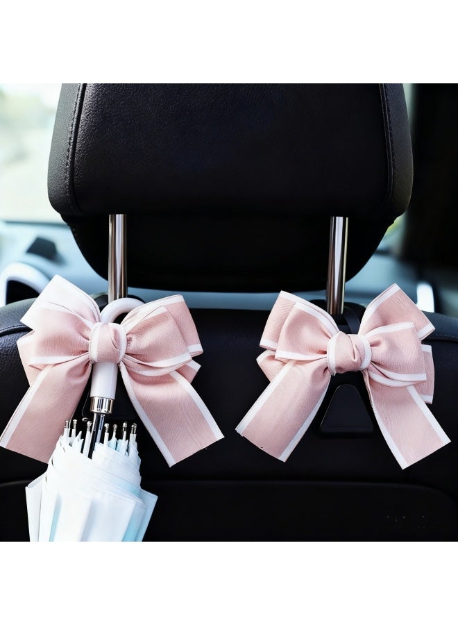 خطاطيف حقيبة السيارة، شماعة خطاف مسند رأس مقعد السيارة ذو قوس لطيف للحقائب والحقائب، ملحقات السيارة الموفرة للفضاء (وردية اللون) - Image 3