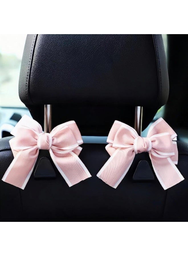 خطاطيف حقيبة السيارة، شماعة خطاف مسند رأس مقعد السيارة ذو قوس لطيف للحقائب والحقائب، ملحقات السيارة الموفرة للفضاء (وردية اللون) - Image 1