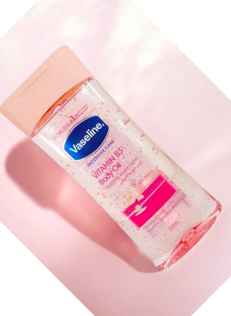 فازلين للعناية المركزة (زيت الجسم بفيتامين ب3) لون بشرة صحي وموحد، طبيعي 100%، 200 مل - Image 2