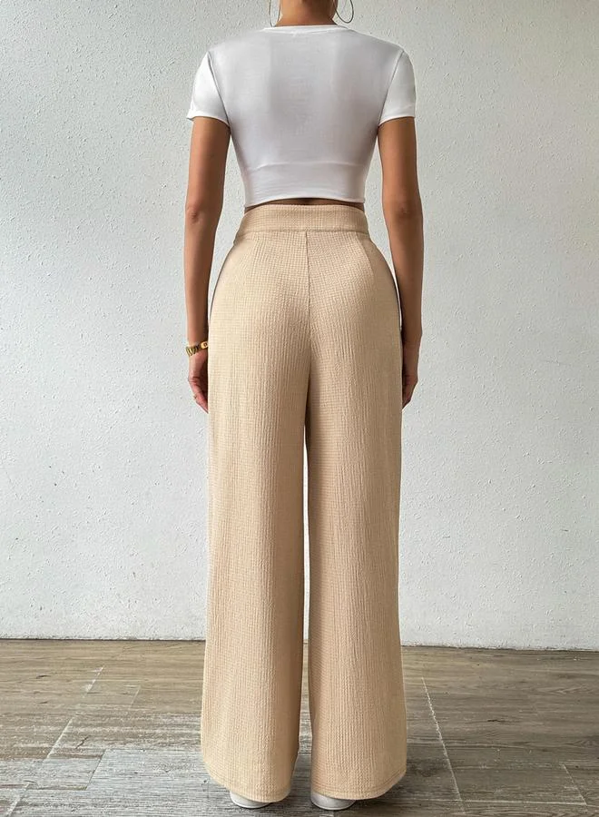 تايك تو بنطال واسع بلون بيج بنسيج بارز