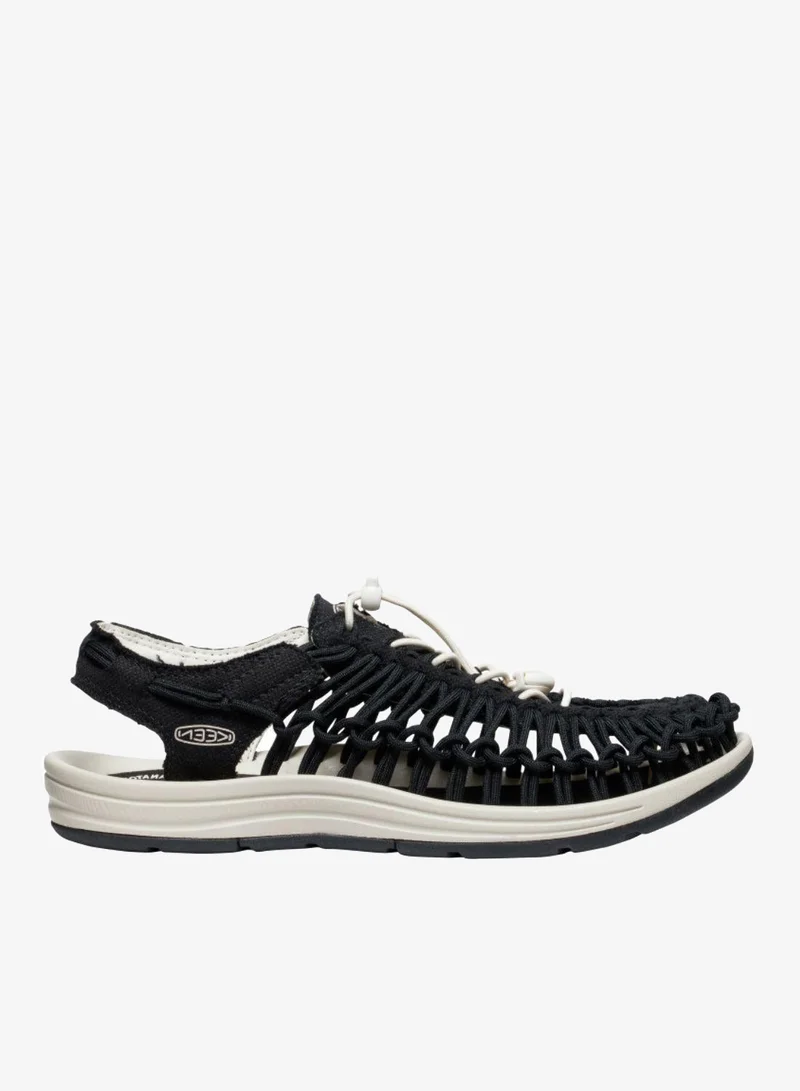 كين صنادل نسائية مسطحة من القماش يو نِيك أسودبيج