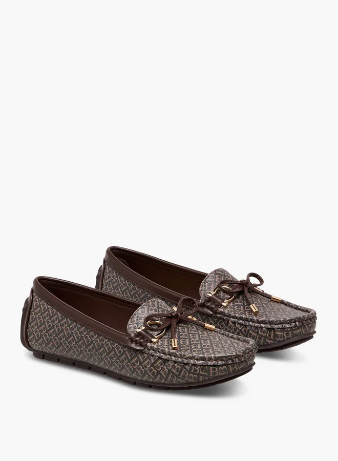 فلورا بيلا من شو إكسبرس Monogram Print Loafers with Bow Accent