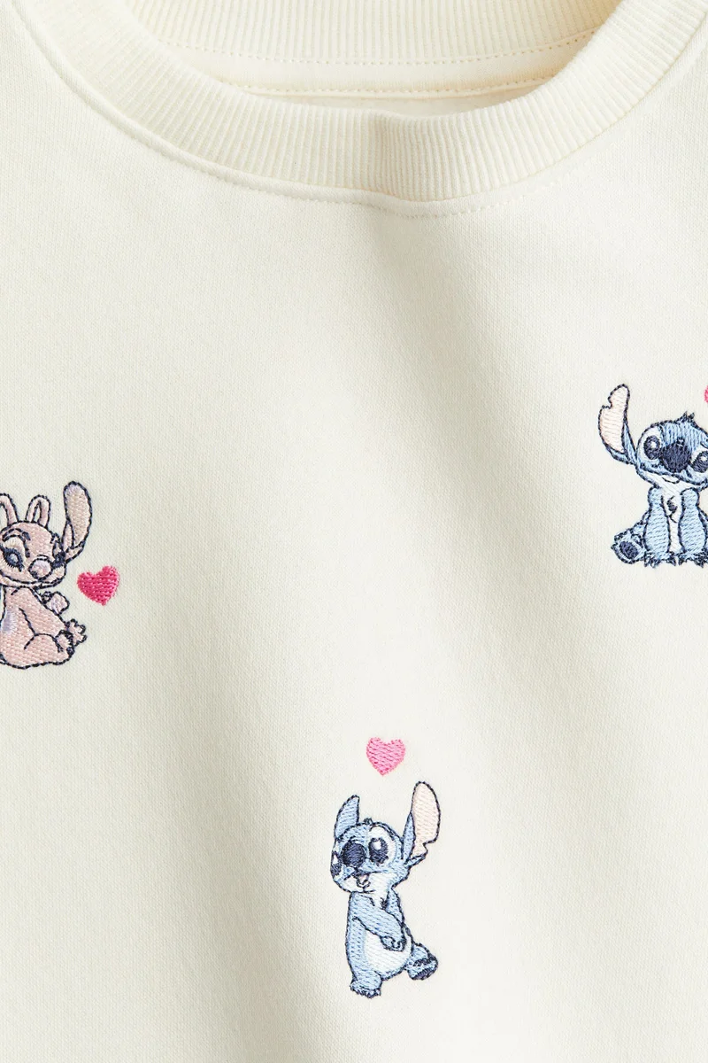 اتش اند ام سويت شيرت مزينة بزخرفة