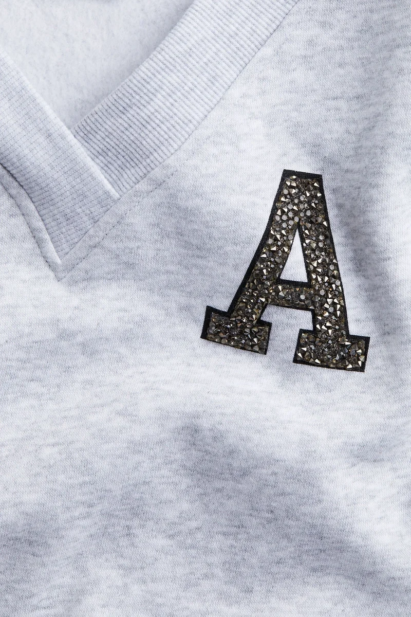 اتش اند ام سويت شيرت بياقة على شكل حرف