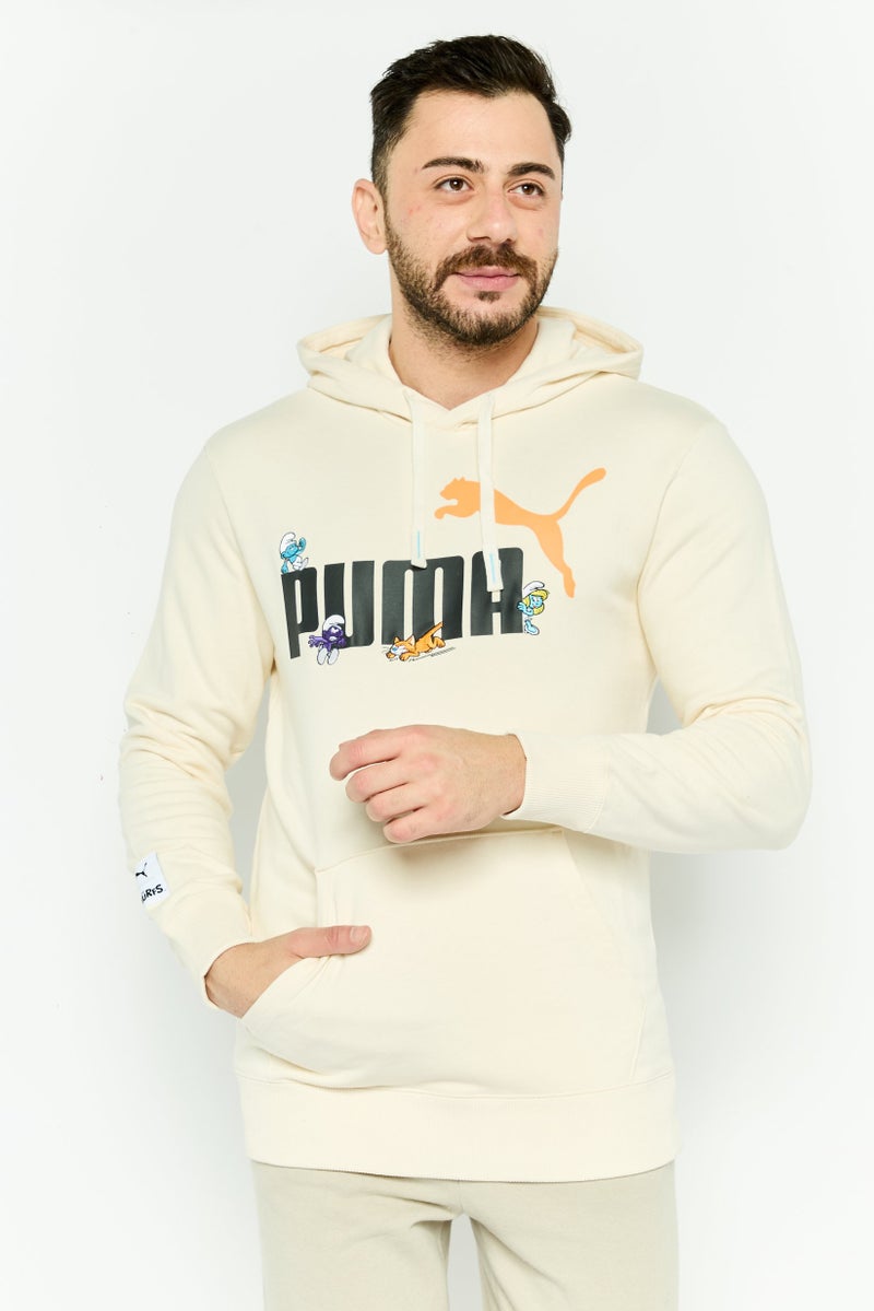 PUMA Puma x The Smurfs Men Sportswear Fit Long Sleeves Outdoor Hoodie, Cream  - Image 1