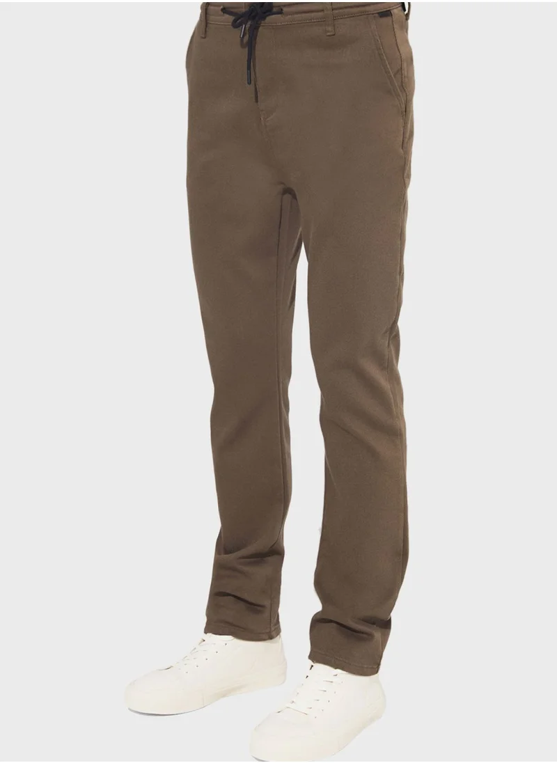 جون Textured Straight Fit Trousers