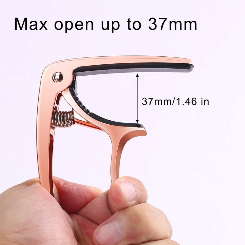 Genericc Guitar Capo, Ukulele Capo with 1 set of guitar strings & 4 picks Guitar Accessories for Acoustic Classical and Electric - Image 1