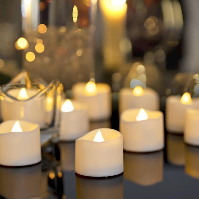 48PACK NOVELTY FLICKERING FLAMELESS TEA LIGHTS CANDLES 200HOURS BATTERYOPERATED LED FAKE CANDLES FOR WEDDING TABLE CENTERPIECESPROPOSALANNIVERSARY WHITE BASE 15 H13