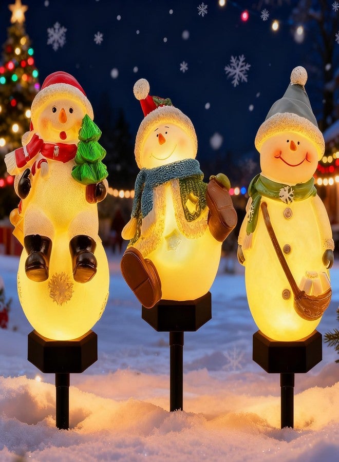 إكساسينين زينة رجل الثلج الشمسية من إكساسينين، مصابيح أرضية مقاومة للماء على شكل رجل الثلج لعيد الميلاد، مناسبة للفناء والحديقة والممرات، وديكورات العطلات الشتوية (عبوة من 3 قطع) - Image 1