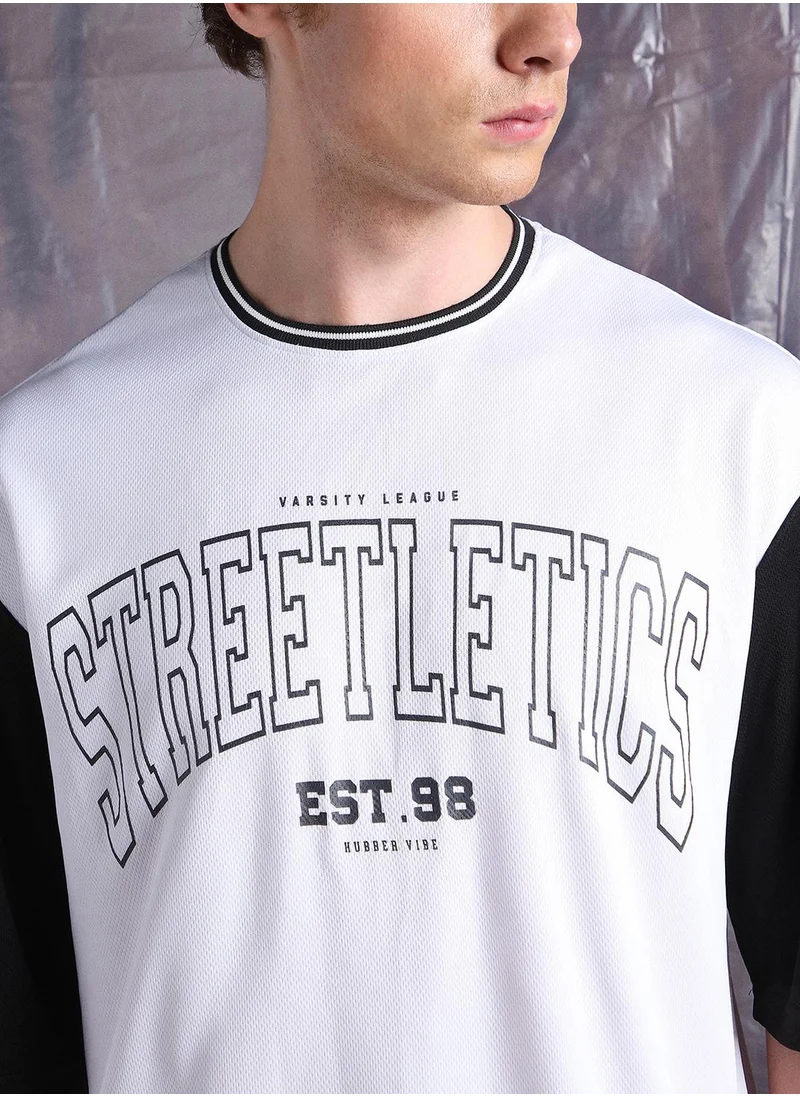 هوبرهولمي White Oversized Tshirts Printed design crafted from 100% Polyester featuring Half Sleeve with Slip on closure.