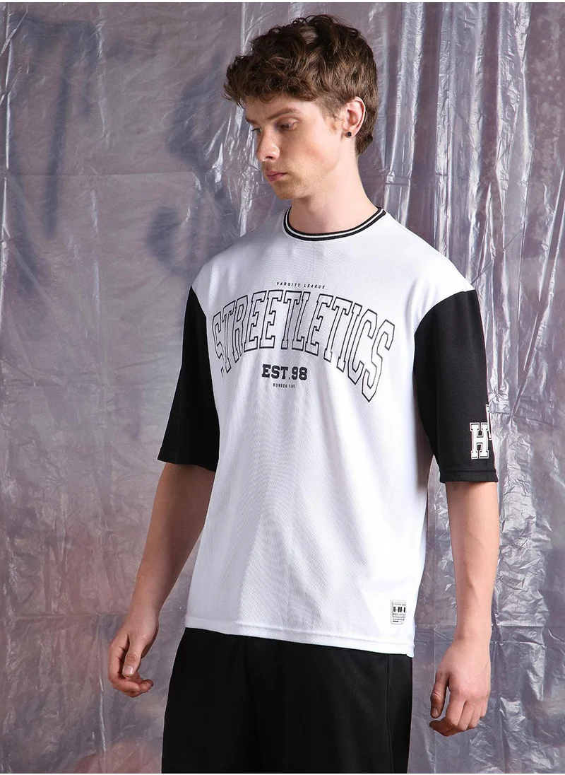 هوبرهولمي White Oversized Tshirts Printed design crafted from 100% Polyester featuring Half Sleeve with Slip on closure.
