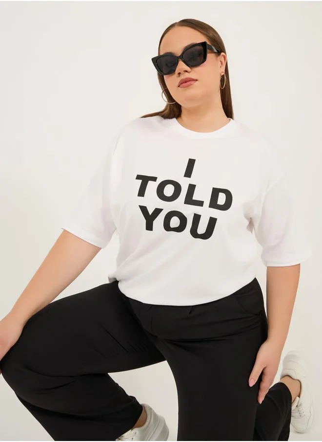 Styli Styli Plus Size Slogan Print Round Neck Oversized T-Shirt