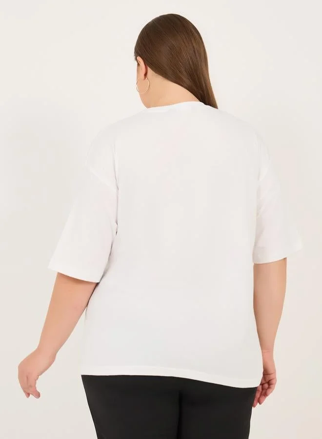 Styli Styli Plus Size Slogan Print Round Neck Oversized T-Shirt