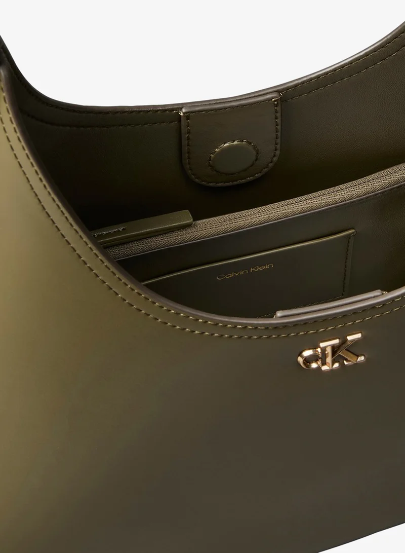 Calvin Klein  Monogram Hardware Curved Shoulder Bag for Women | Best Price UAE