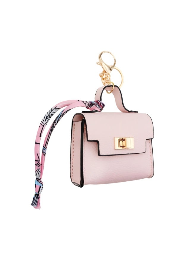 حقيبة مفاتيح من الجلد البولي يوريثان متعددة الاستخدامات بتصميم حقيبة رucksack صغيرة، تعمل كحقيبة لحفظ العملات وحامل سماعات وهدية تجميل صغيرة، وهي حقيبة زخرفية لطيفة، تناسب النساء والبنات المراهقات، وتُستخدم في الحمل اليومي أو كهدية عيد ميلاد. - Image 1