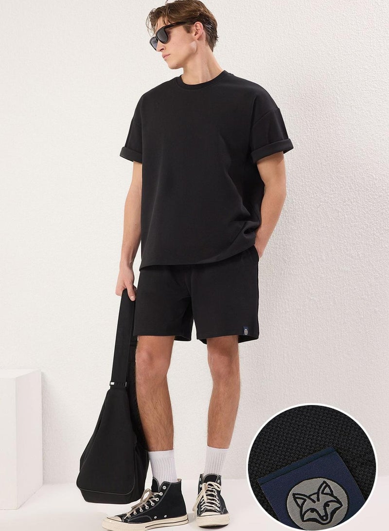 trendyol Black Oversized Thick 100% Cotton Tshirt Shorts 2-Piece Tracksuit Set Tmnss25Em00007 - Image 1