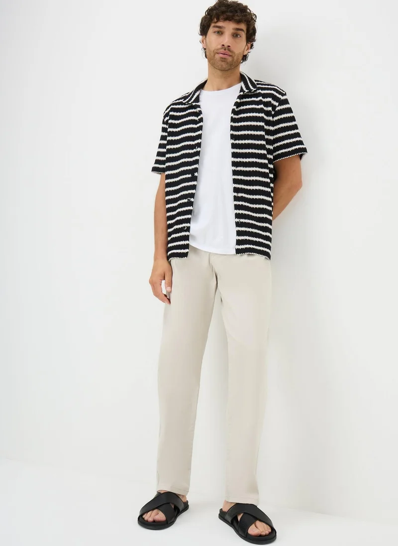 ماتلان Beige Pleated Chinos