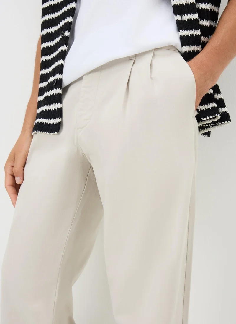 ماتلان Beige Pleated Chinos