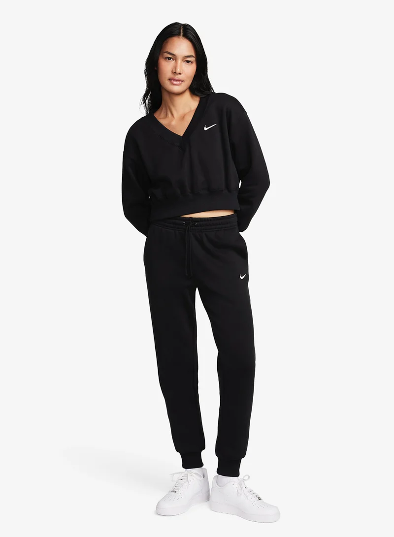 نايكي بنطلون فينيكس فليس متوسط الارتفاع قياسي