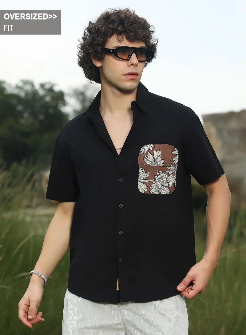Campus Sutra Campus Sutra Men's Chocolate Brown & Obsidian Black Flora-Block Shirt For Casual Wear | Spread Collar | Short Sleeves | Button Closure | Oversized Shirt Crafted With Comfort Fit For Everyday Wear