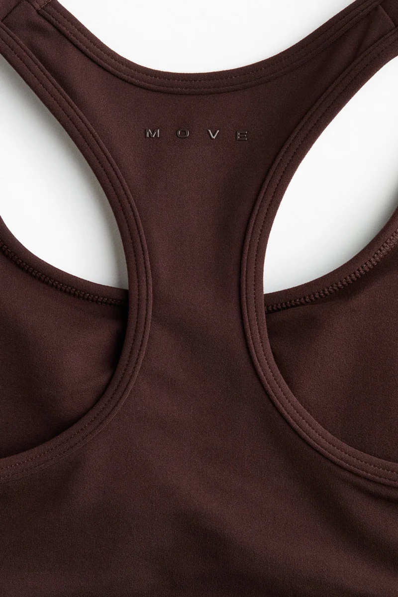 اتش اند ام حمالة صدر رياضية متوسطة الدعم من نسيج سوفت موف