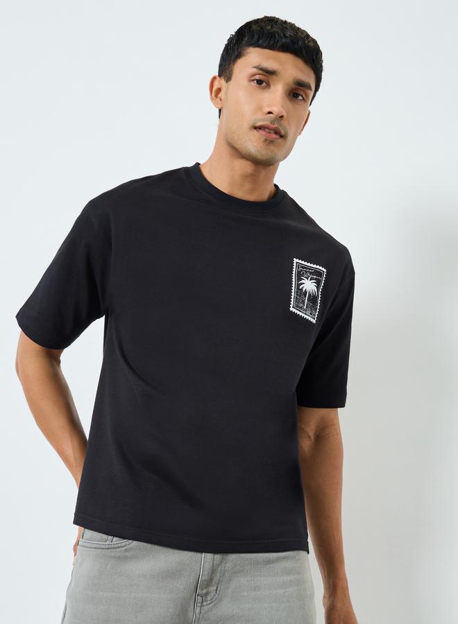Styli Men Black Graphic Print Oversized T-Shirt - Image 1